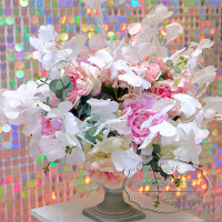 Композиция из текстильных цветов с веточками Гинкго в сером вазоне